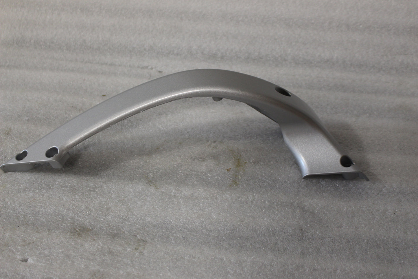 K0101.02A8 NEW OEM 2004-2007 BUELL XB SWINGARM BRACE FLUID SILVER