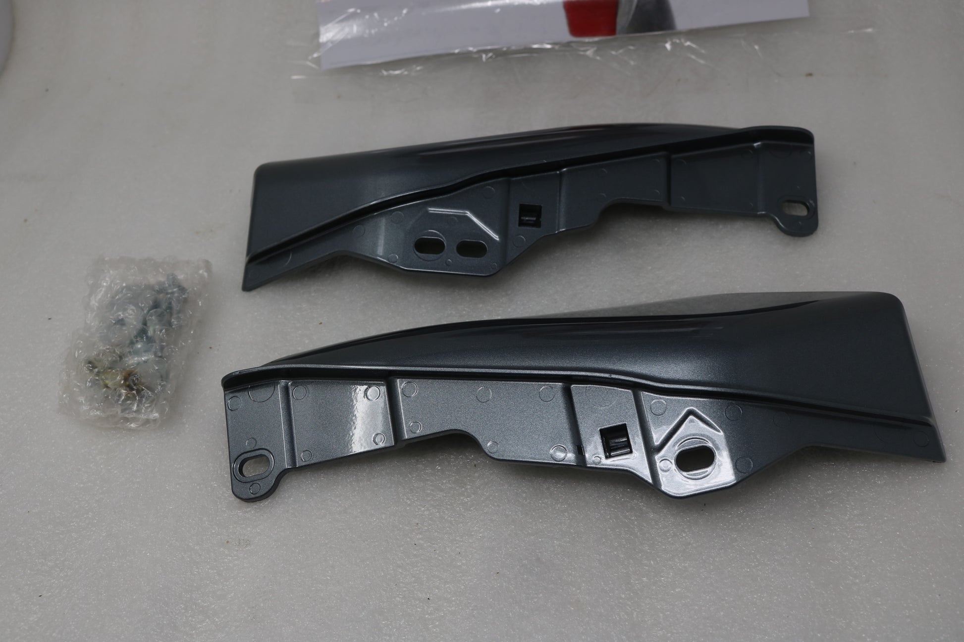 57300225EHU NEW OEM 2009 AND NEWER HARLEY-DAVIDSON TOURING MID FRAME DEFLECTORS MAGNETIC GRAY
