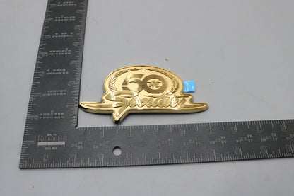 62324-07 NEW OEM 2007 HARLEY-DAVIDSON SPORTSTER 50TH ANV LT FUEL TANK MEDALLION